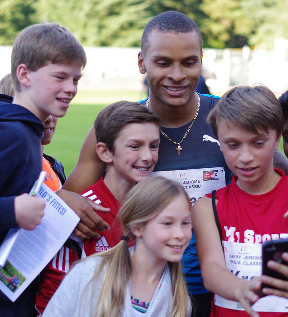 Andre with youth athletes